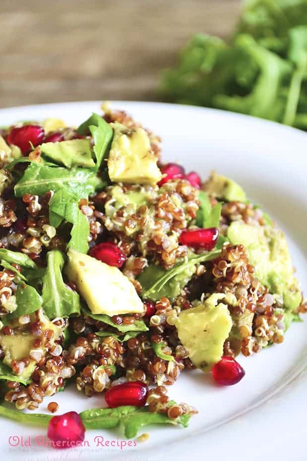 Red quinoa, pomegranate and arugula salad