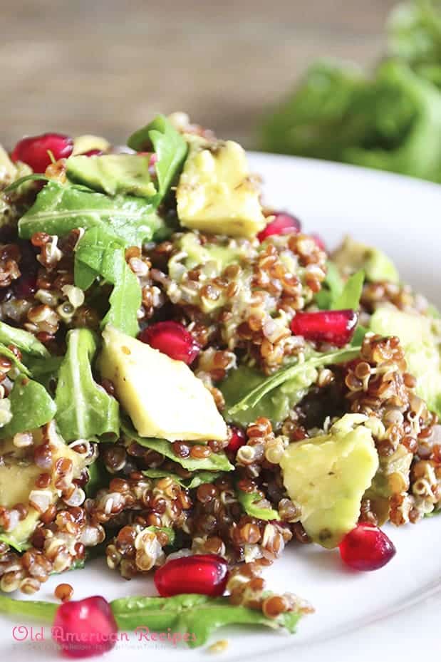 Red quinoa, pomegranate and arugula salad